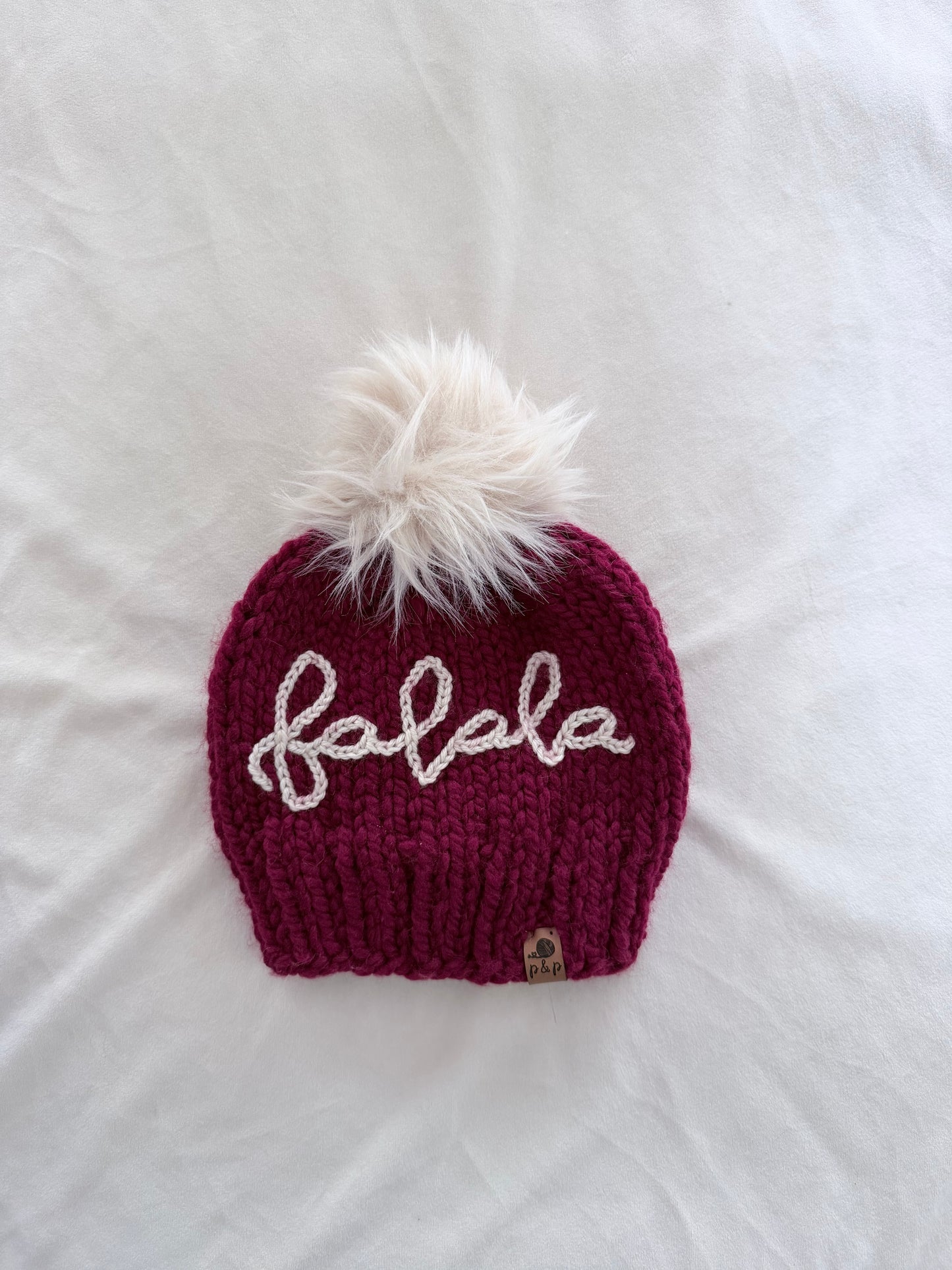 Ready-to-Ship Child Embroidered Fa La La Knit Hat | Cranberry
